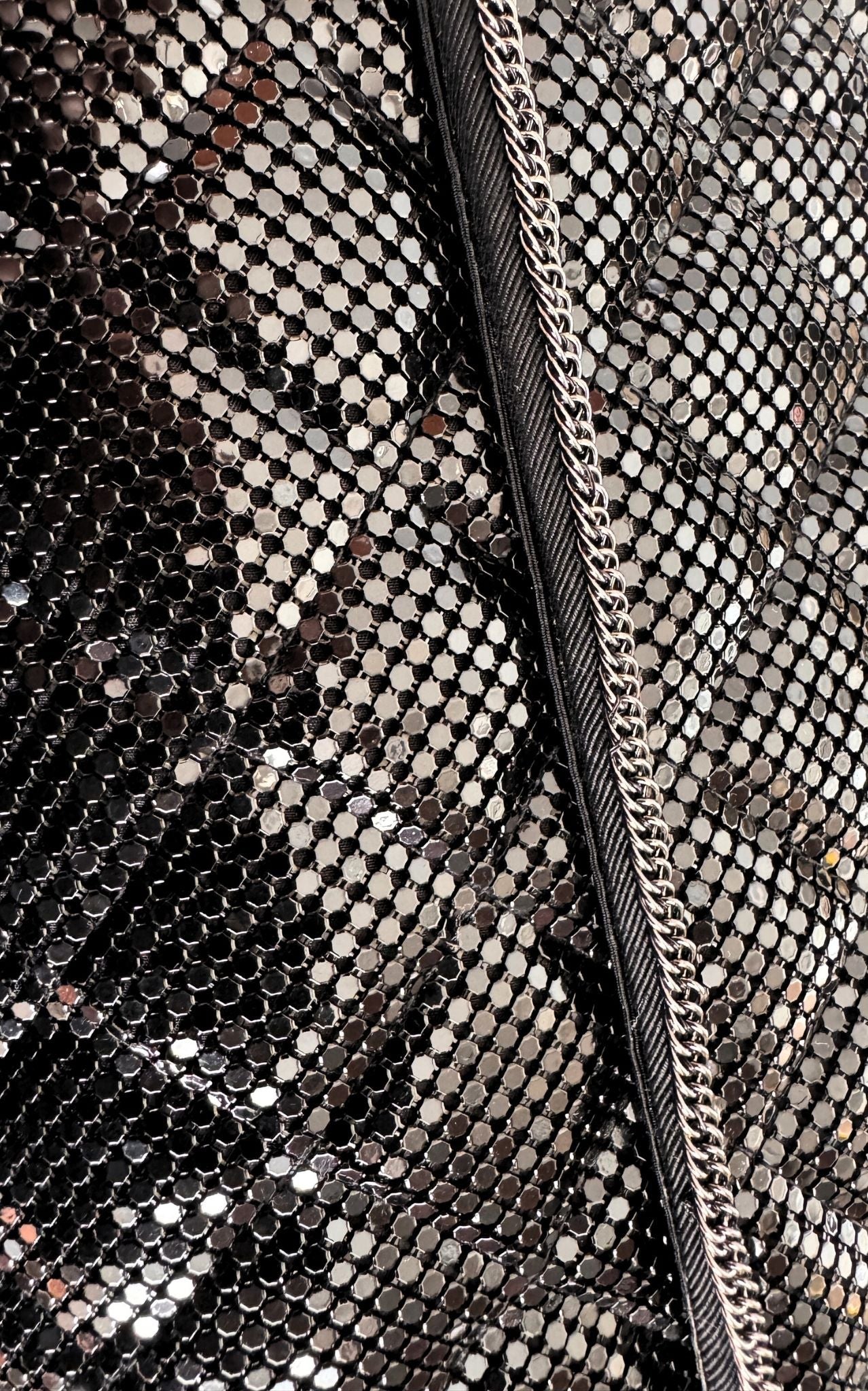 BCBG Maxazria black metal mesh quilted chain clutch bag