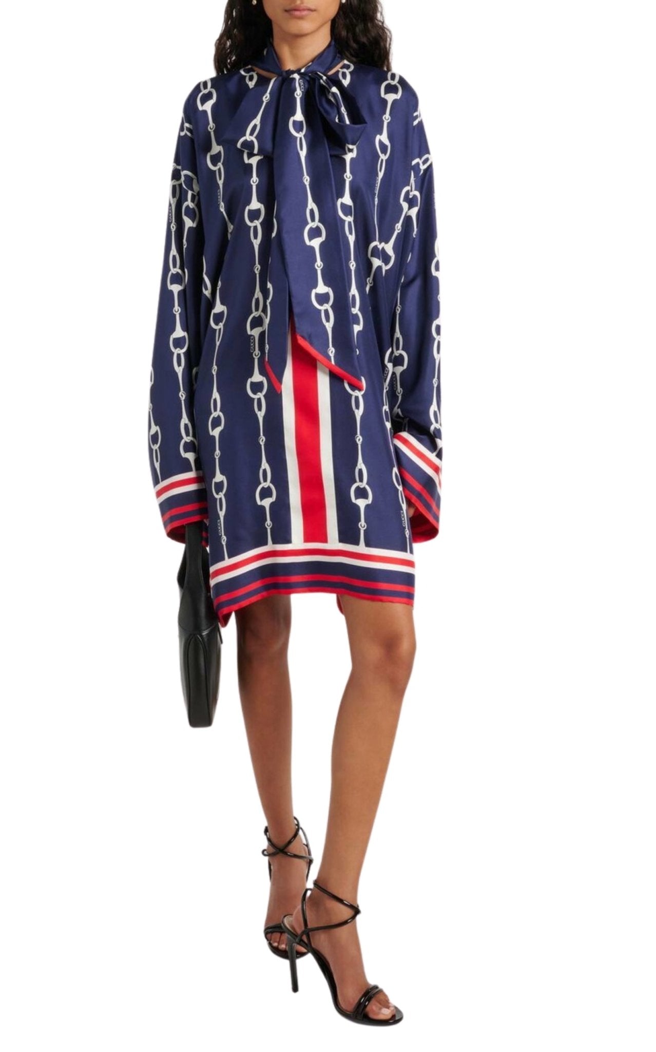 Gucci Black Strappy Patent Leather Sandals with Knot Detail on a model