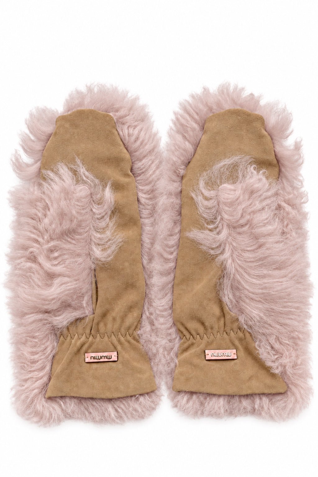 A pair of tan suede mitten-style gloves with fluffy pale pink faux fur trim, shown flat against a white background. A small sewn label on each cuff reads 'PRIMALIFE'.
