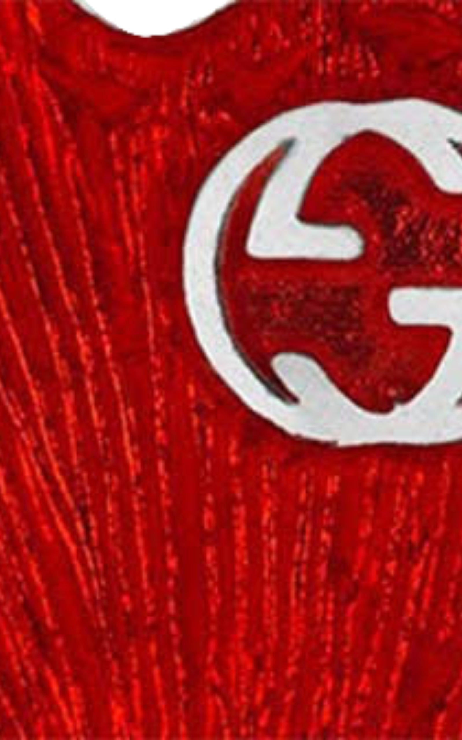 Close-up of Gucci interlocking G heart stud earrings