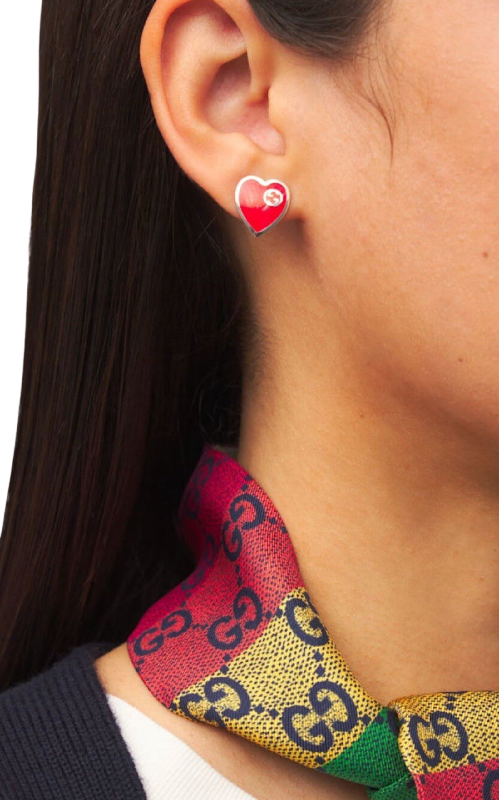 Gucci interlocking G heart stud earrings worn on model