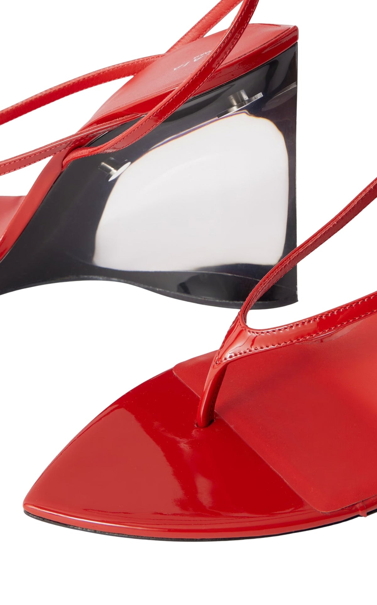 alaia red patent leather thong sandals with a clear wedge heel and thin red straps, shown on a white background.