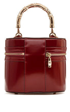 Gucci burgundy glossy leather bucket bag with bamboo-inspired top handle