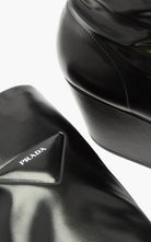 Prada black platform over-the-knee boots with square toe