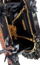 BCBG Max Azria tiger-print satin fringed clutch front view