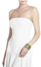 BCBGMAXAZRIA Grünes Armband mit Blumen- und Steinverzierung – Laufsteg-Katalog