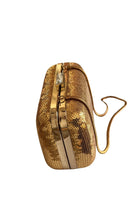 BCBG Max Azria gold sequin hardcase clutch with crystal clasp