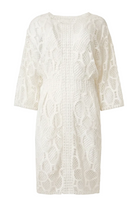 An off-white lace dress with three-quarter sleeves and a textured, openwork pattern, shown against a plain light background.