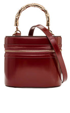 Gucci burgundy glossy leather bucket bag with bamboo-inspired top handle