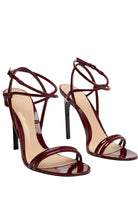 Sandales à lanières en cuir verni noir Gucci avec nœud décoratif