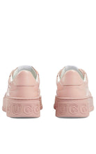 Gucci GG Embossed - logo Leather Sneakers - Runway Catalog