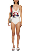 Gucci ivory sparkling jersey swimsuit with Interlocking G 1921 print