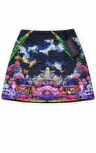 A high-waisted A-line mini skirt by Missoni, featuring a vibrant, multicolored graphic print with a dark navy/black textured background and colorful architectural and floral motifs.