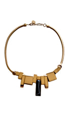 May Moma gold-tone geometric pendant necklace with black accent