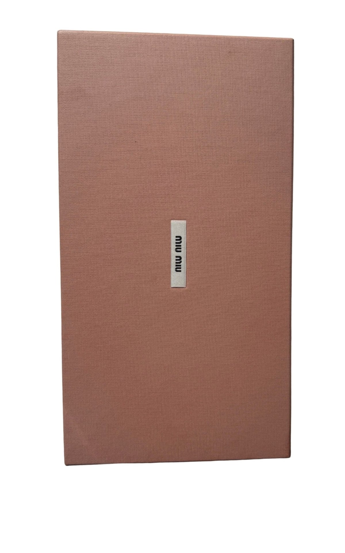 A rectangular, textured dusty rose or mauve-colored box with a small white vertical label in the center featuring the black 'miu miu' logo, set against a plain white background.