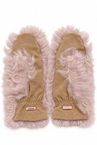 A pair of tan suede mitten-style gloves with fluffy pale pink faux fur trim, shown flat against a white background. A small sewn label on each cuff reads 'PRIMALIFE'.