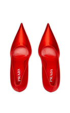 Leather sole of Prada red satin heels with logo plaque made in Italy from top