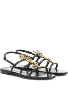 Saint Laurent Metal Monogram Cassandra Sandals - Runway Catalog